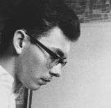 Friedrich Kittler on his typewriter at a young age.jpg